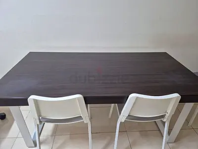 Used dining table and 3 chairs are for sale in very good condition