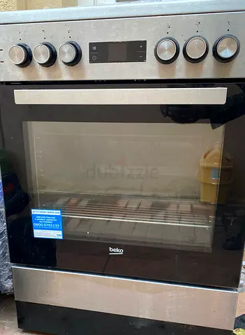 Beko 60 cm free standing electric cooker with ceramic hob + electric oven