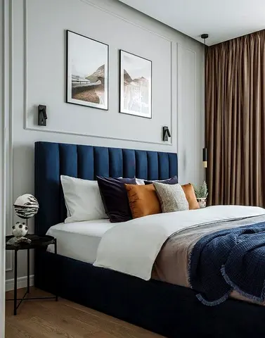 Modern navy upholstered king bed with vertical channel headboard