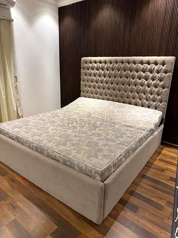 King-size tufted upholstered bed frame with mattress - neutral beige