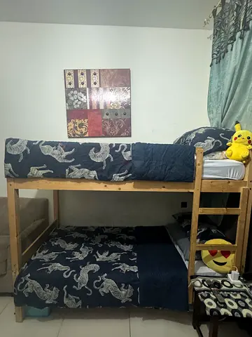 Wooden Bunk Bed with Zebra Print Mattresses - Good Condition