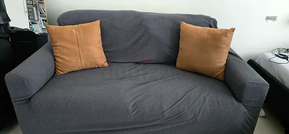 Two-seater sofa with washable slipcover and cushions