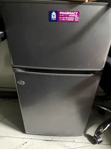 Compact top-freezer refrigerator - good working condition(mini fridge)