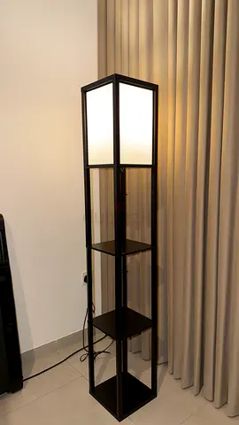 Tall Black Glass-Panel Floor Lamp with Display Shelves