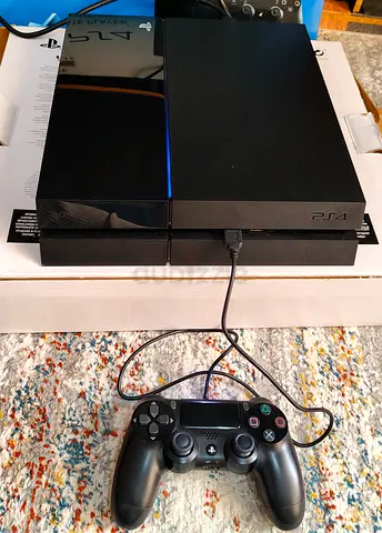 Sony Ps4 Fat 500 GB 1 controller with installed Games