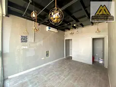 Best Commercial Mezzanine Shop for Rent in Al Jurf 3 – Prime Location & High-End Finishing