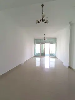 For annual rent in Al Taawun: 2BR apartment with balcony, 3 bathrooms, pool, gym, and kids’ area. 