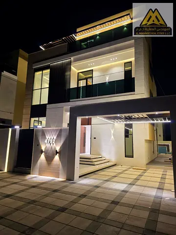 A luxurious villa is available for annual rent in Al Helio, Ajman. The villa consists of two floors plus a rooftop and features a modern design with s