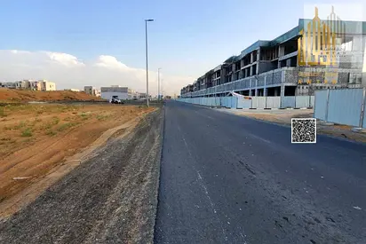 Commercial land on a main street, fees included
