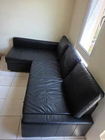 Black L-shaped Faux Leather Sofa - Good Condition