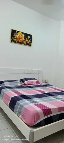 White Queen Bed Frame with Mattress and Checked Bedding - Good Condition