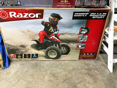 Razor Dirt Quad – 24V Electric 4-Wheeler Ride-On for Kids 8+, Twist-Grip Variable-Speed Acceleration