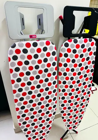 Two ironing boards with covers - good condition