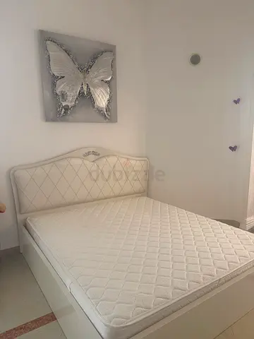 White king size bed frame with mattress - good condition