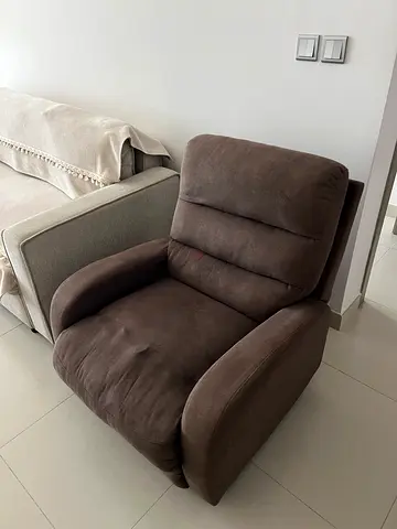 Comfortable brown fabric recliner armchair - good condition