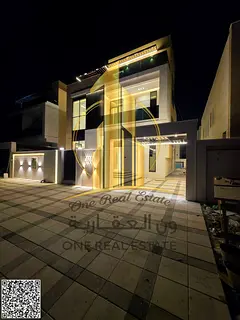 A luxurious, modern villa with two floors plus a rooftop terrace and a private swimming pool