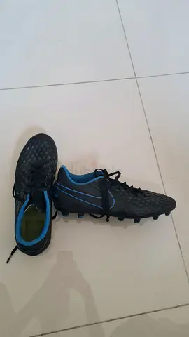 Used black blue football boots, size around EU 44 Nike tiempo