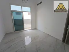 A spacious one-bedroom apartment with a balcony offering an open view. Second-hand in Al-Jarf 3, nea
