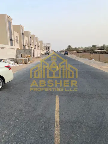 A prime villa plot in Al Yasmin area, available for purchase in installments including registration fees.