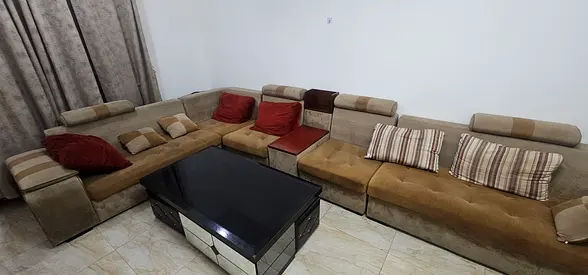 Large L-shaped sectional sofa with cushions - used, good condition