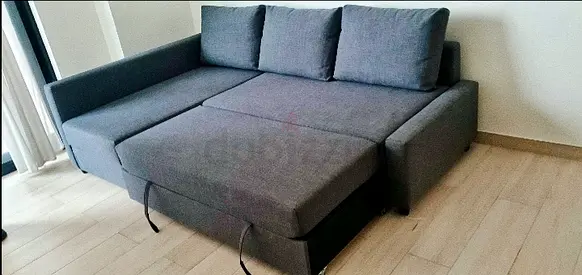 IKEA L shap Sofa store cum bed you can fix the storage lift or Right