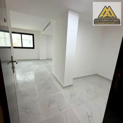 A spacious first-tenant studio is available for annual rent in Mohammed Bin Zayed 2, Ajman, near Al Tallah 1. The studio is located in a modern family