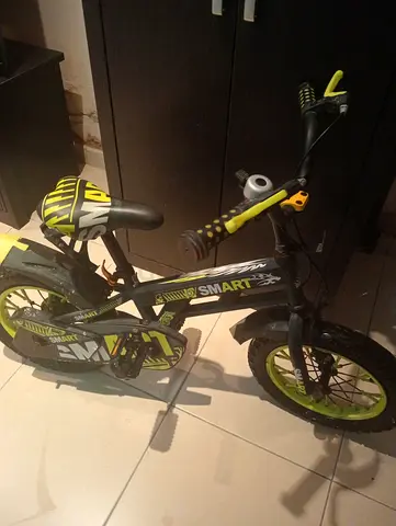 Kids 16-inch SMART bicycle with training wheels - good condition