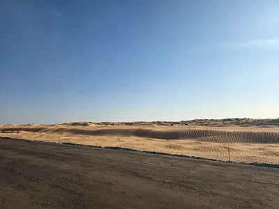 Two adjacent plots of land for sale in Sharjah, Al Sahma 1 area, Al Ruwaidat suburb.