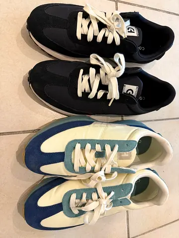 Two pairs of casual sneakers — black and blue/white, used exactly twice. Gift that didnt fit