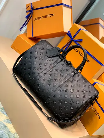 Louis Vuitton Black Monogram Embossed Keepall Bandoulière - Large Travel Bag