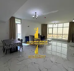 With a sea view. Luxurious two-bedroom apartment with a living room and an open balcony. Ajman, Oasi