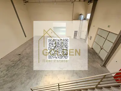 Two Connected Warehouses for Rent – 6,100 sq. ft. | 56 kW Power Supply | AED 195,000 per Year. Ideally located on the main road, this property offers