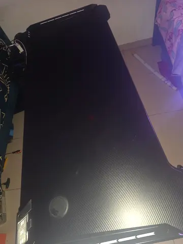 Black wooden gaming table with black metal legs and red metal supports [B. H](140.60)