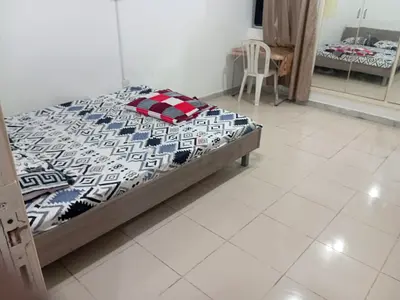 Daily,weekly Furnished room in hamdan street for couple,family,ladies,executives C A/C building neat
