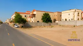 Residential and commercial land; corner plot with direct access to two streets, on Al-Talah Street i