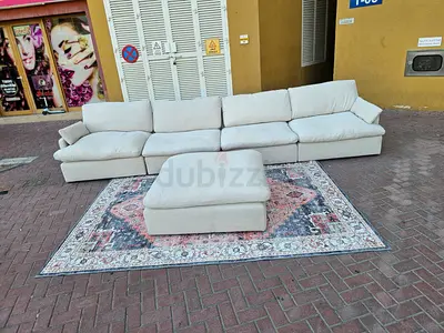 Home Center swin feather filled sofa with footstool
