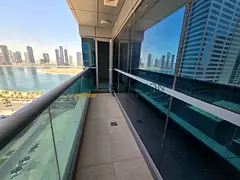 2BR apartment, sea view, balcony, gym, pool, built-in wardrobes.