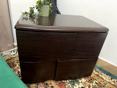 Dark Wood Corner Nightstand with Three Drawers
