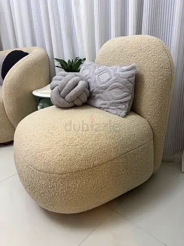 Beige boucle lounge chair — modern cozy accent chair