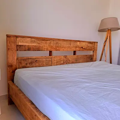 Solid  Mango Wood Double Bed Frame with Headboard - Rustic Finish. Bed is from Lucky Furniture brand