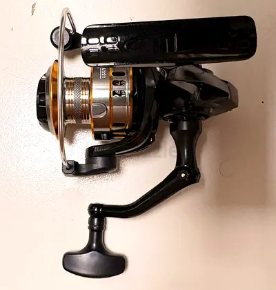 Spinning Fishing Reel - Good Condition, Ready to Use