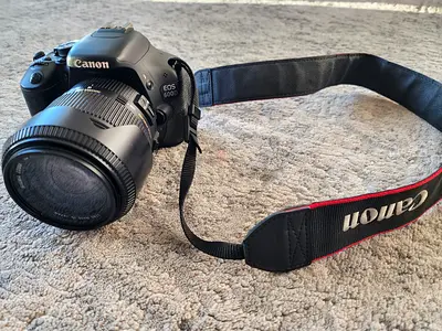 Canon EOS 600D DSLR with sigma 18 200 Lens amd tripod benro t880ex. And bag. All New