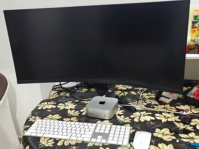 Curved Ultrawide Monitor with Mac mini, Apple Keyboard  Magic Mouse