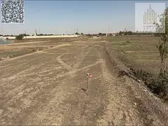 A prime investment opportunity in Ajman  Al Manama 13 Residential land for sale in a quiet an