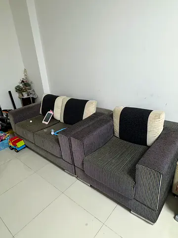 Gray L-shaped Fabric Sofa with Cushions - Good Condition