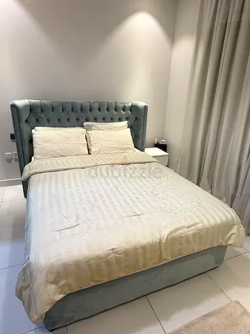 Queen Bed with set of drawers and a nightstand for sale