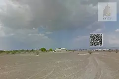 Investment land at a below-market price in Al Manama, Block 8, Ajman. Residential/Commercial.