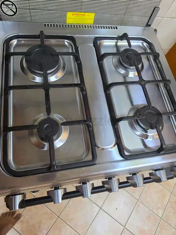 Stainless Steel 4-Burner Gas Stove with Oven - Good Working Condition