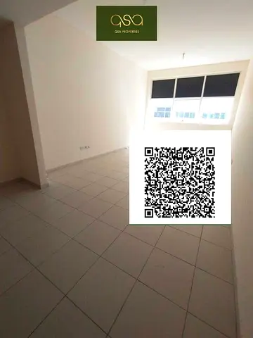 Neat and clean studio with wardrobes, open kitchen, centralized AC, with parking is available for rent in Ajman One Tower, Ajman!