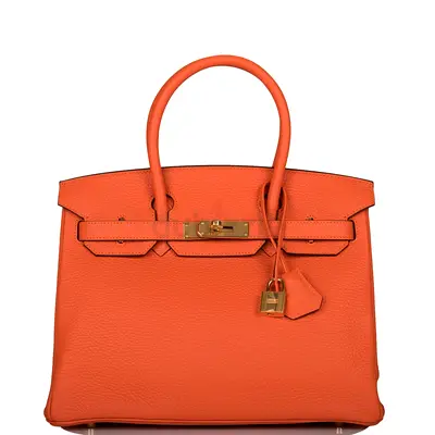 Hermès Birkin 30 in Orange Clemence leather featuring prominent gold hardware. Supar master